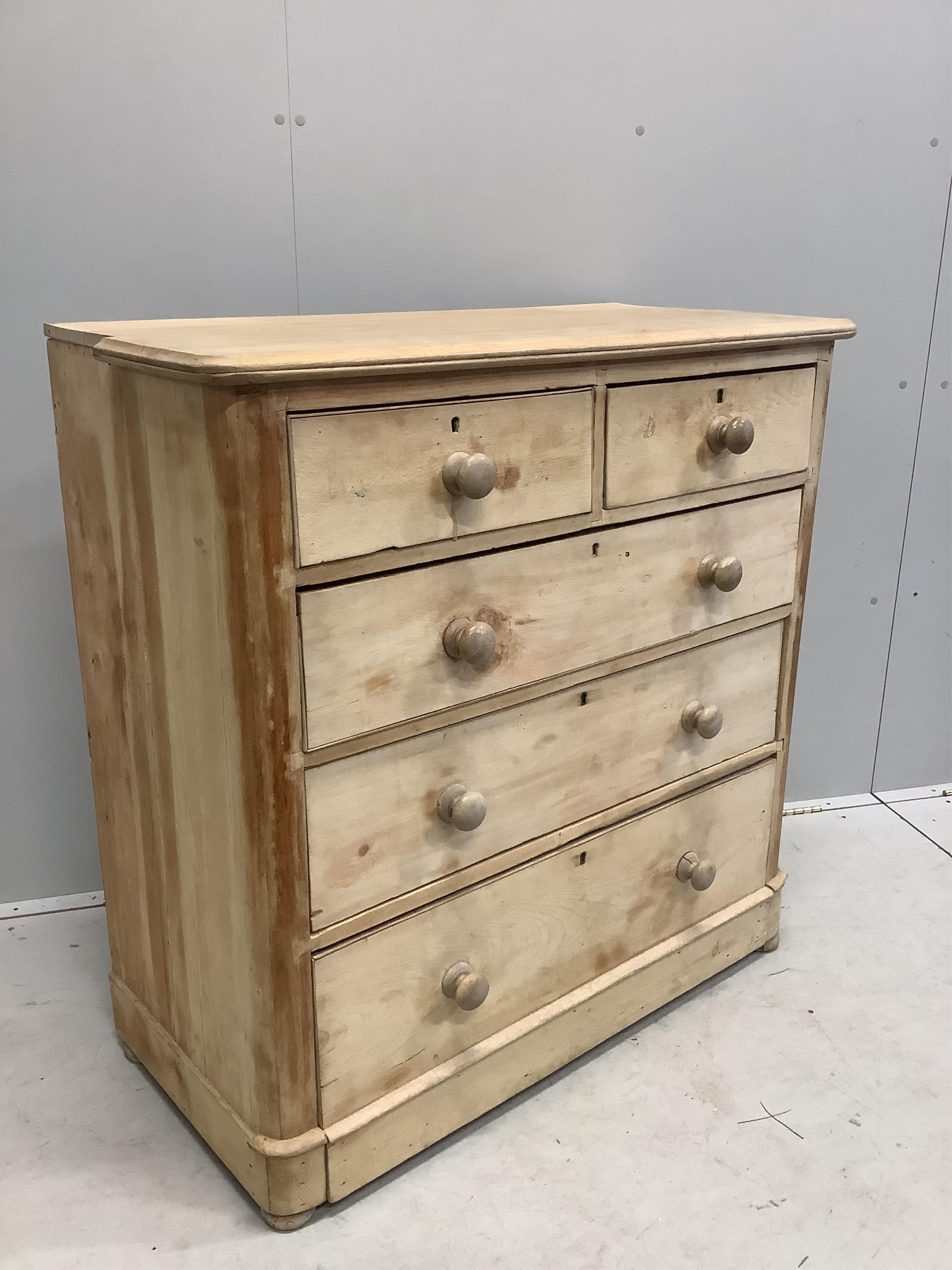 A Victorian pine chest, width 104cm, depth 49cm, height 105cm. Condition - fair, top cut to both sides